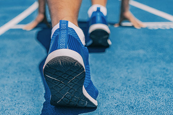 person ready to run on a track