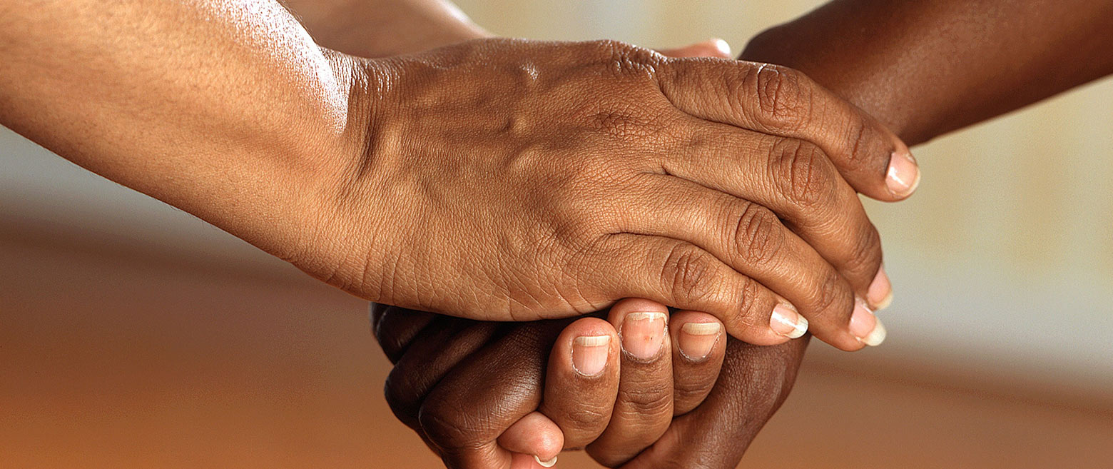 Hands holding each other