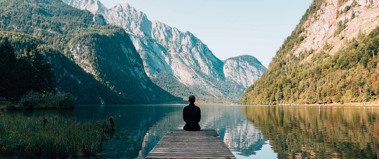 Person looking at mountain and outdoor scenery