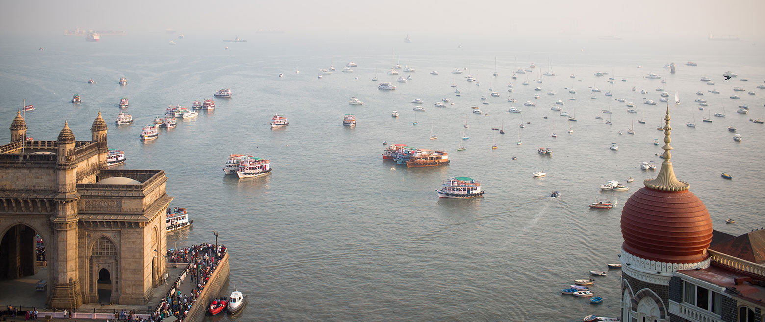 Image of boats approaching shore in India