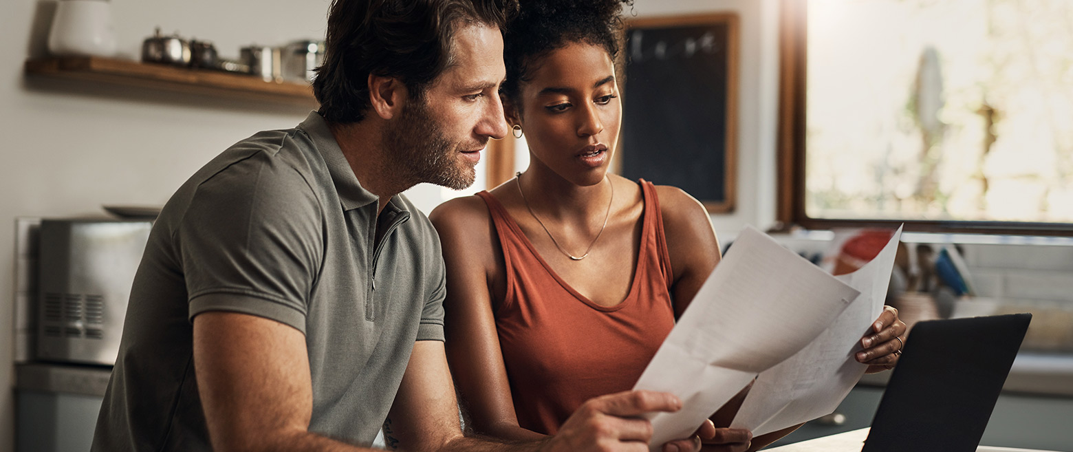 Couple looking over documents