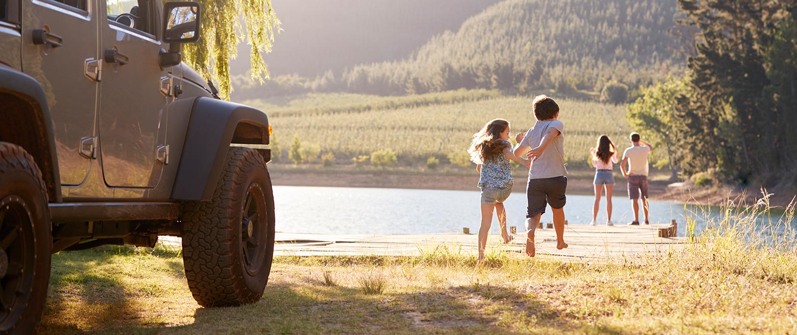 Image of a family getting out of the car