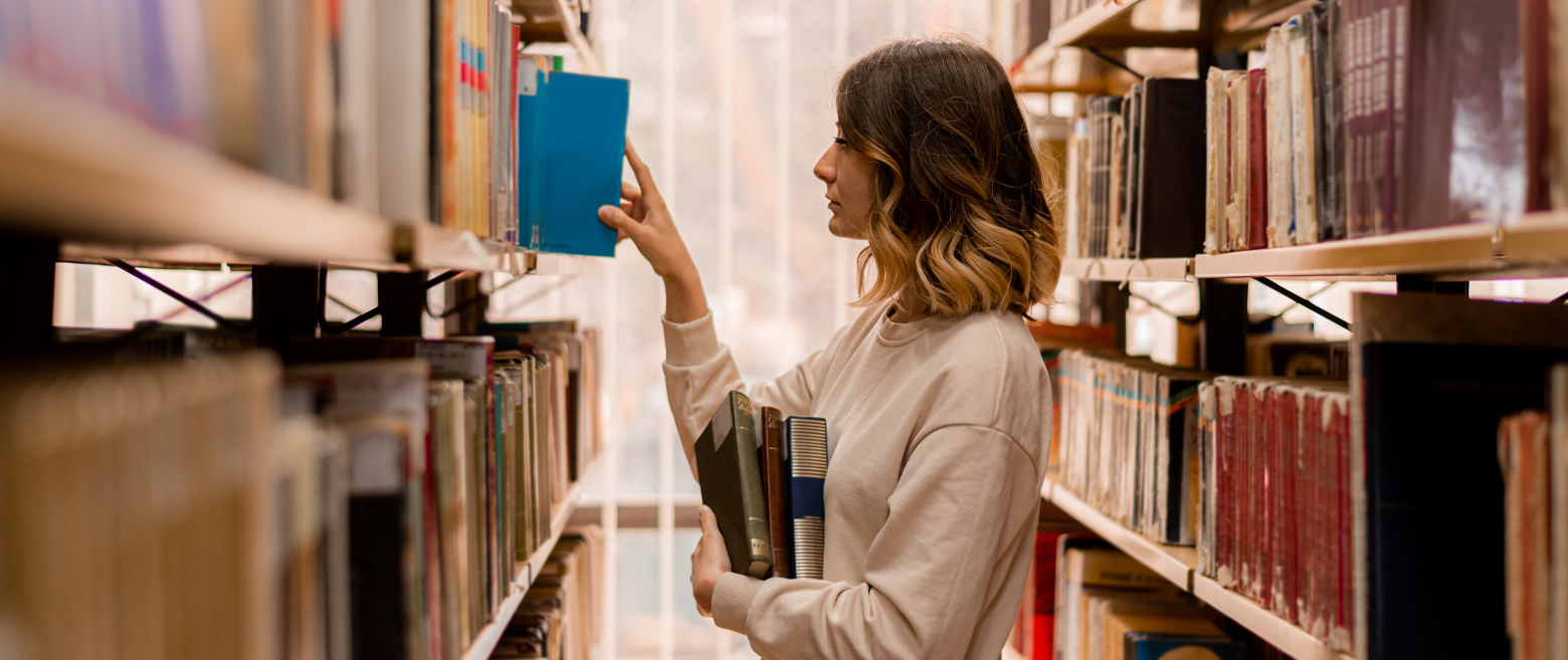 Picking out a book from the library