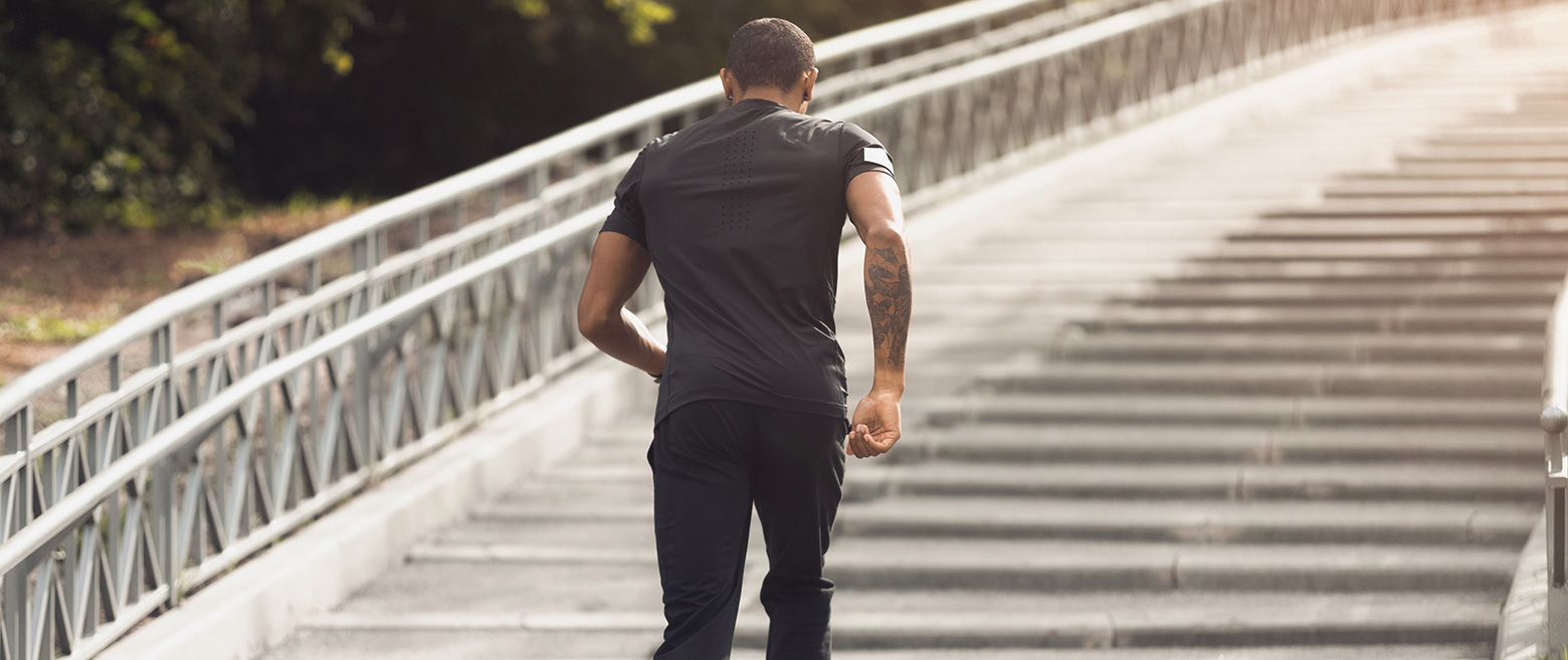 Man running up stairs