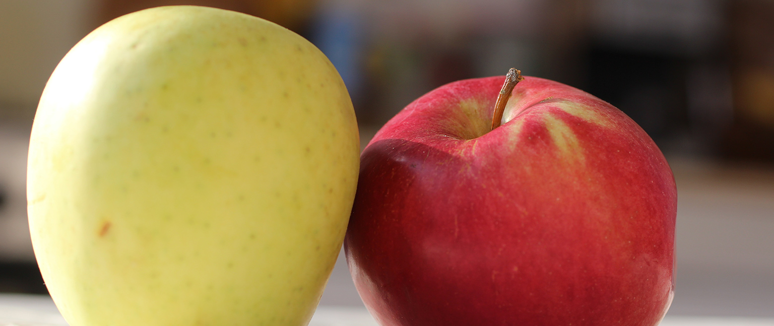 Image of a green apple and red apple.