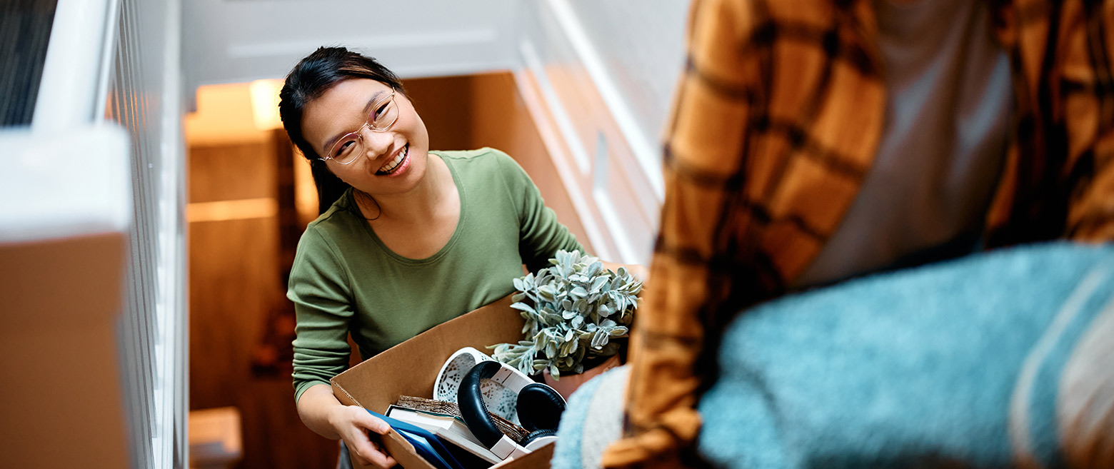 Lady holding moving box