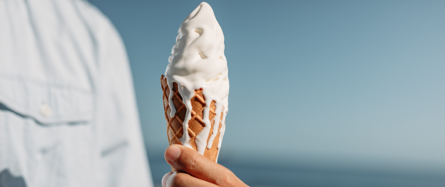 Person holding an ice cream cone