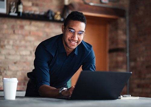 Man typing on computer