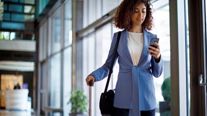 Woman walking thru airport