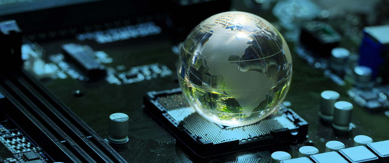 Glass globe sitting on top of a digital chip