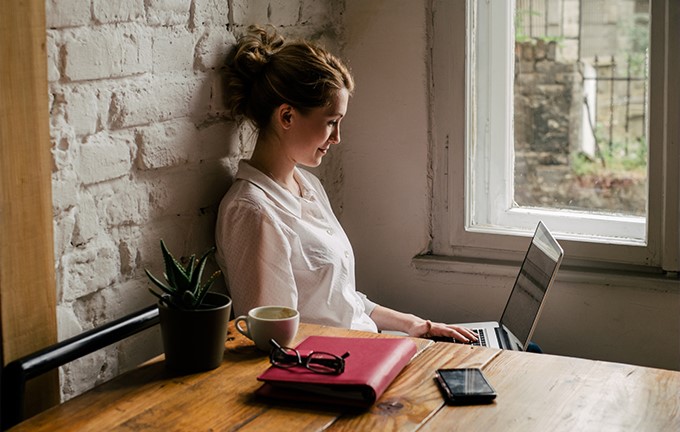 Woman looking at computer