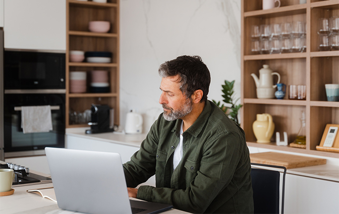 Man looking at a computer