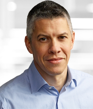 Headshot of Adam Jonas