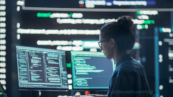 Woman looking at computer screen