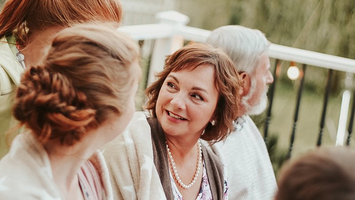 Woman looking at family
